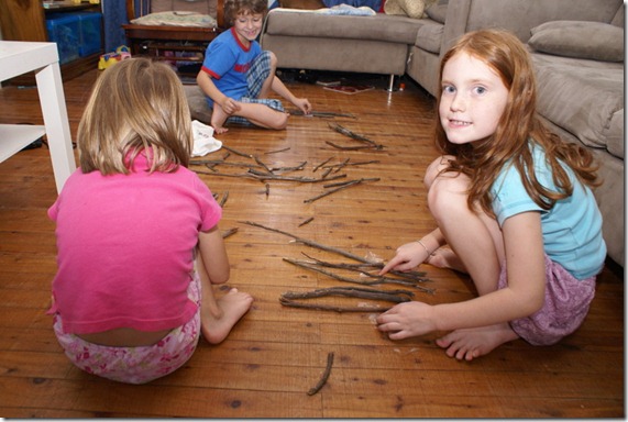 kids with sticks