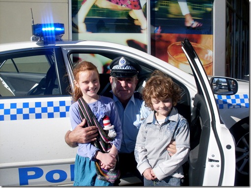 Kids and police officer